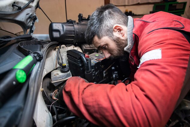 mechanic-working-engine-workshop